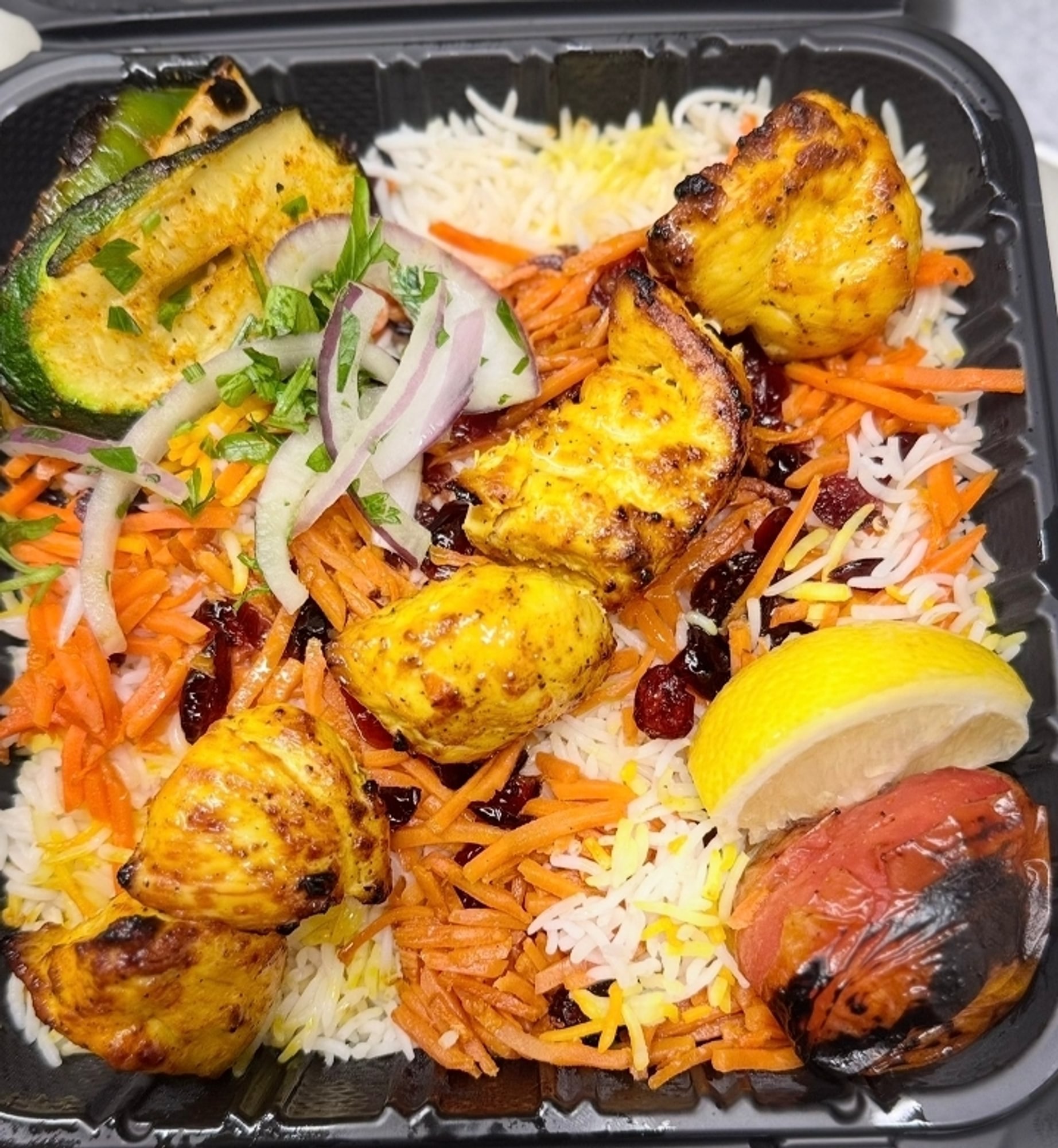 Chicken kabob with seasoned rice