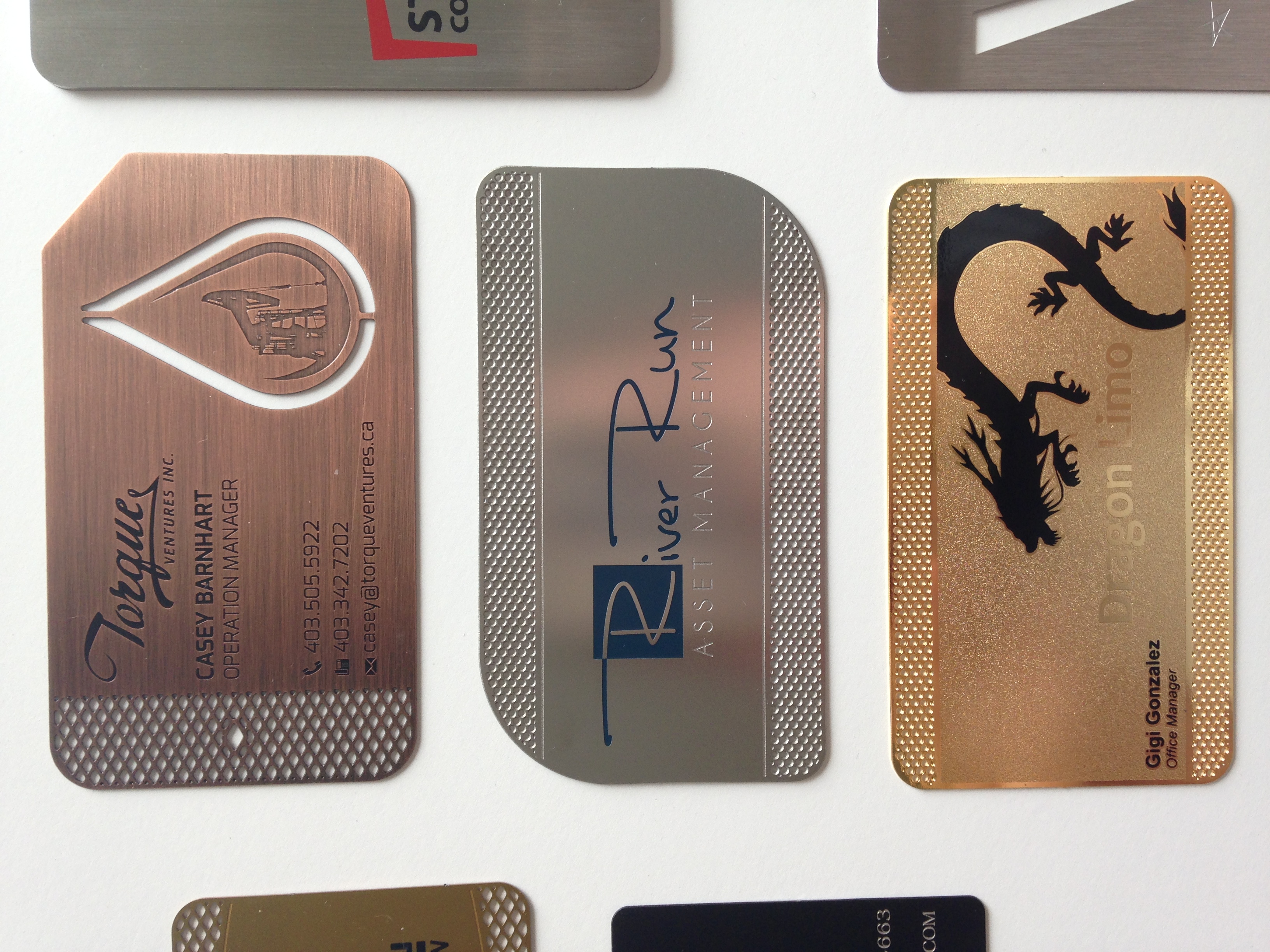 Brass, Steel and Gold , Metal Card finishes with silk screen prints and laser cut outs.