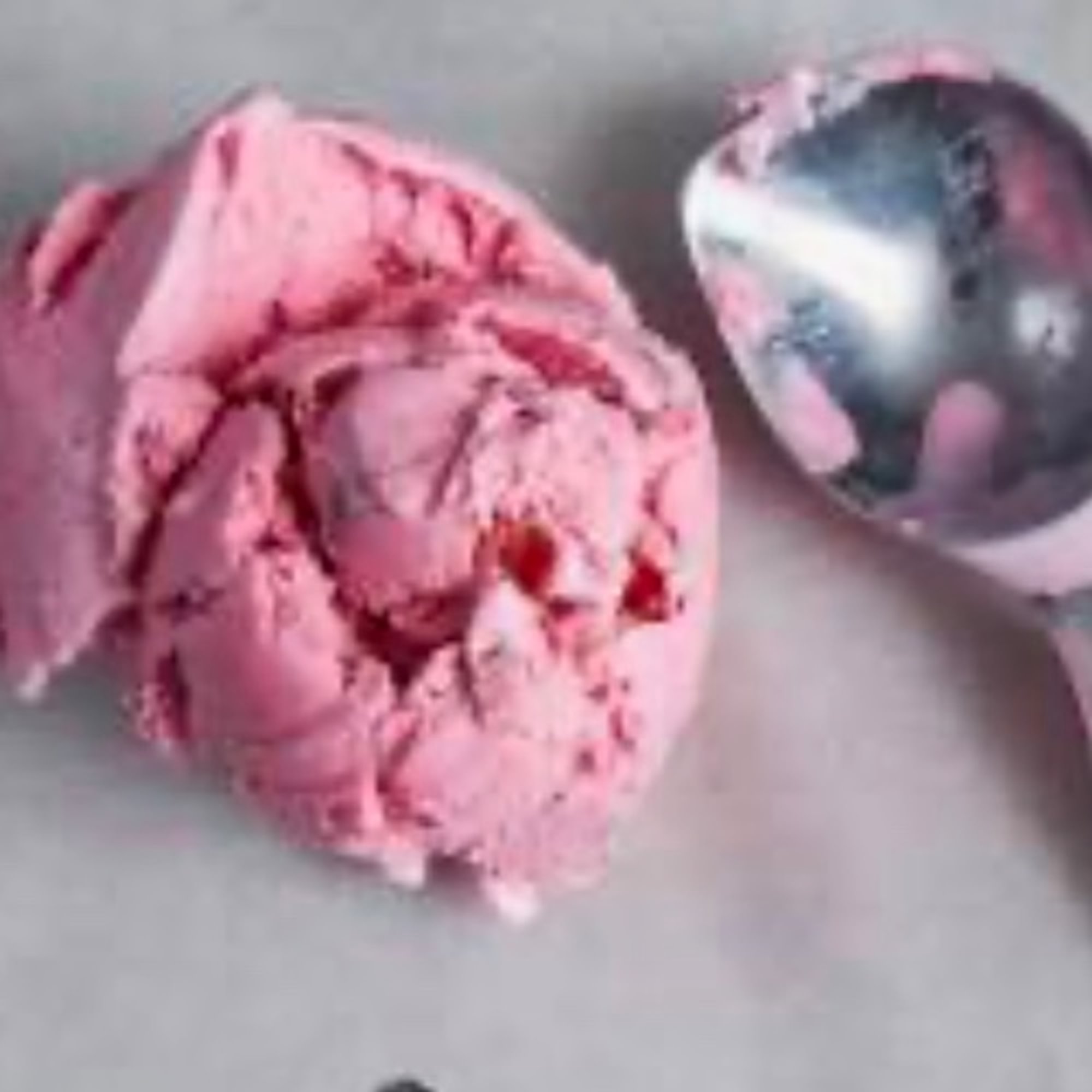 SCOOP OF STRAWBERRY ICE CREAM