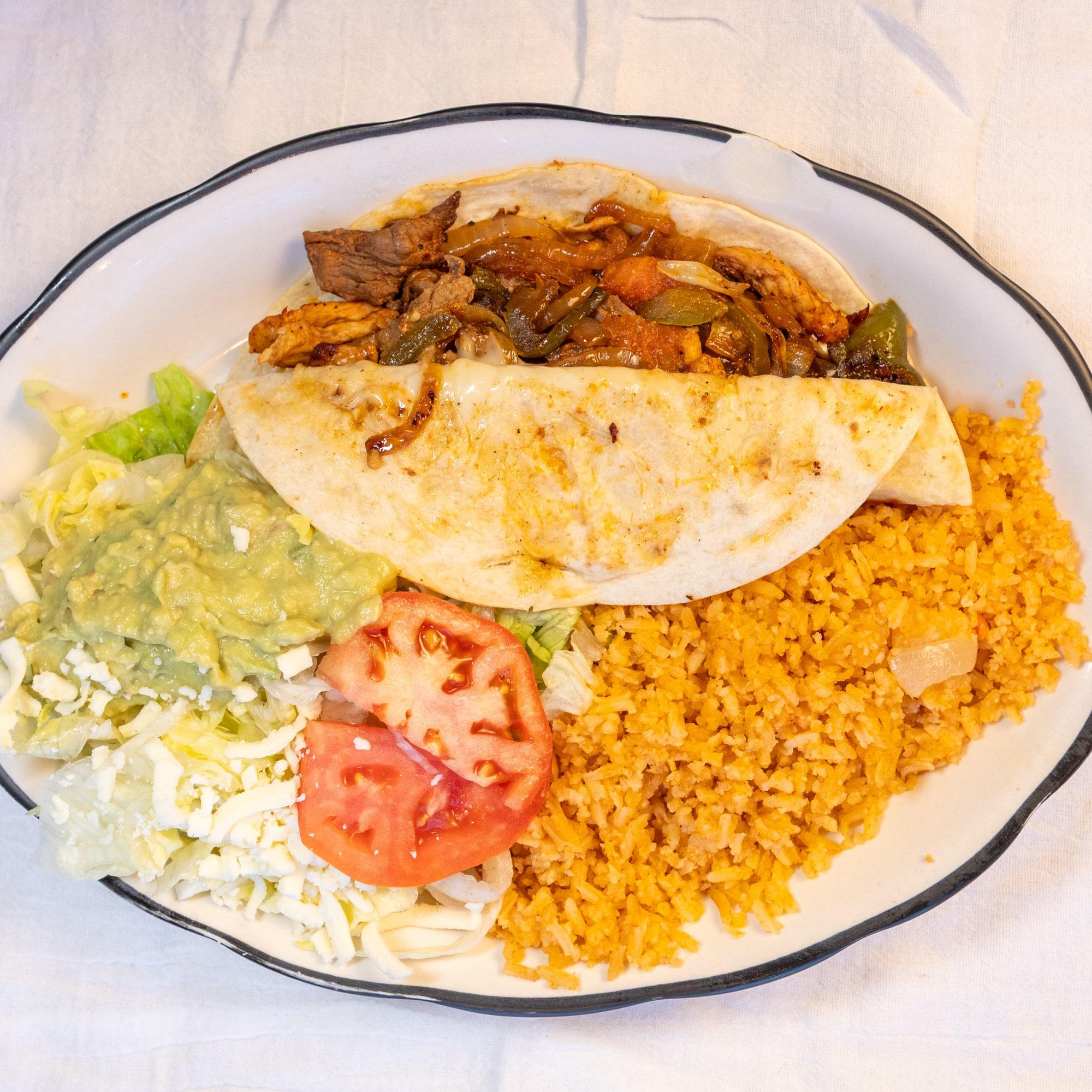 27. One Fajita Quesadilla, Rice & Guacamole Salad