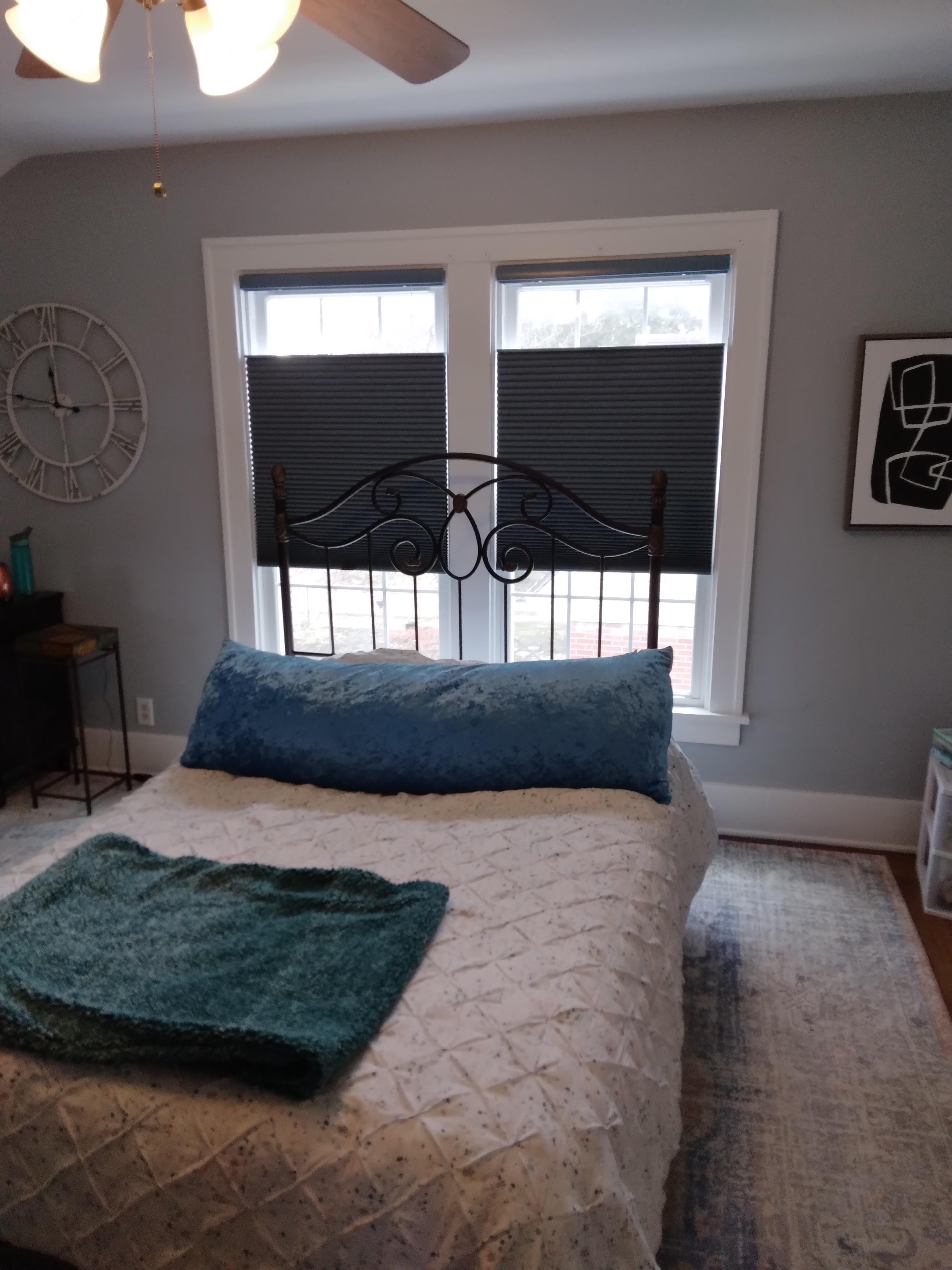These blue cellular shades complement the style and colors in this Springfield Illinois bedroom. Top-down-bottom-up cellular shades add extra versatility to the popular honeycomb shade.  BudgetBlinds  WindowCoverings  Shades  HoneycombShades  CellularShades  SpringfieldIllinois