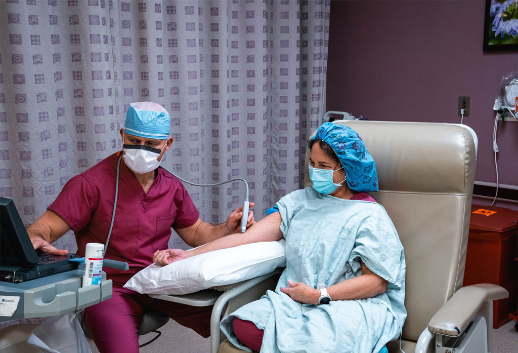 A doctor and patient at Valley Access Center