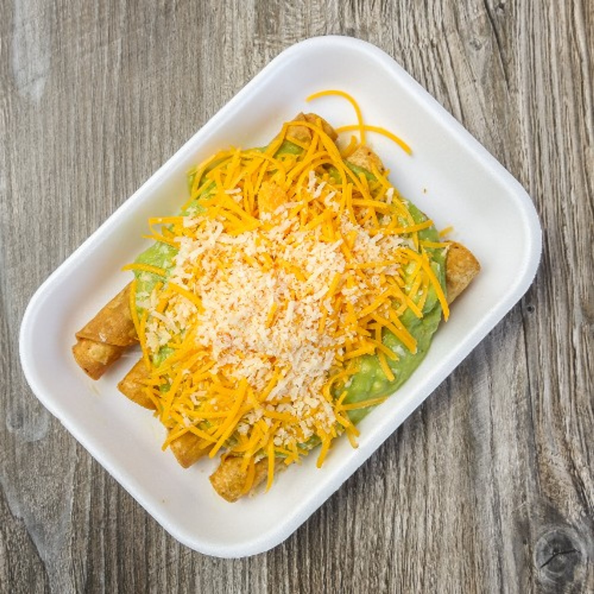5 BEEF ROLLED TACOS GUACAMOLE