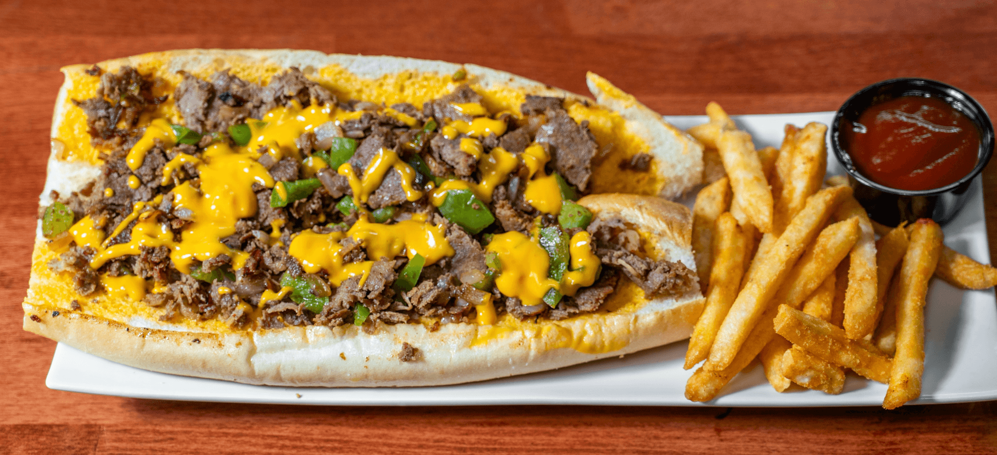 Philly Cheese Steak, Crispy fries.