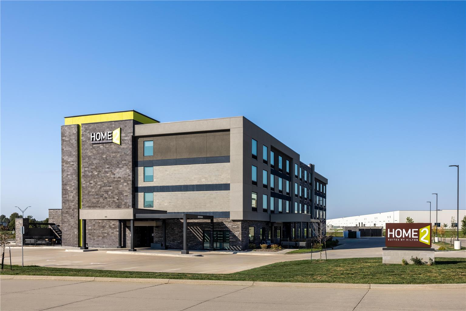 Home2 Suites by Hilton Altoona Des Moines Logo