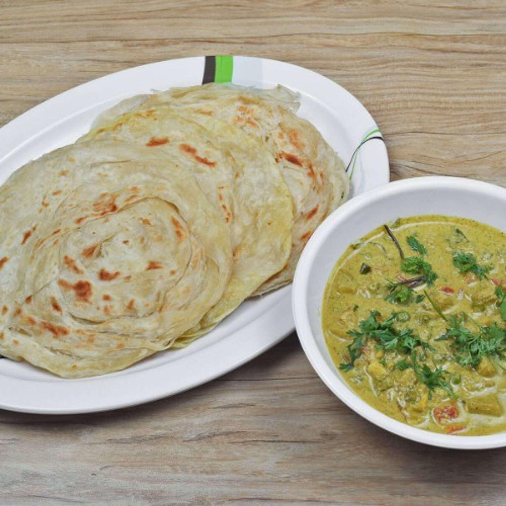Parotta With Veg Curry (2 Pcs)