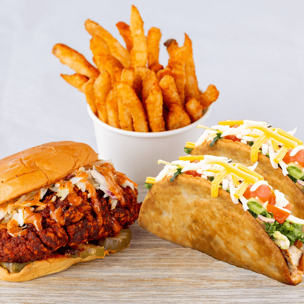 Chicken Sando and Two Crunchy Tacos with fries