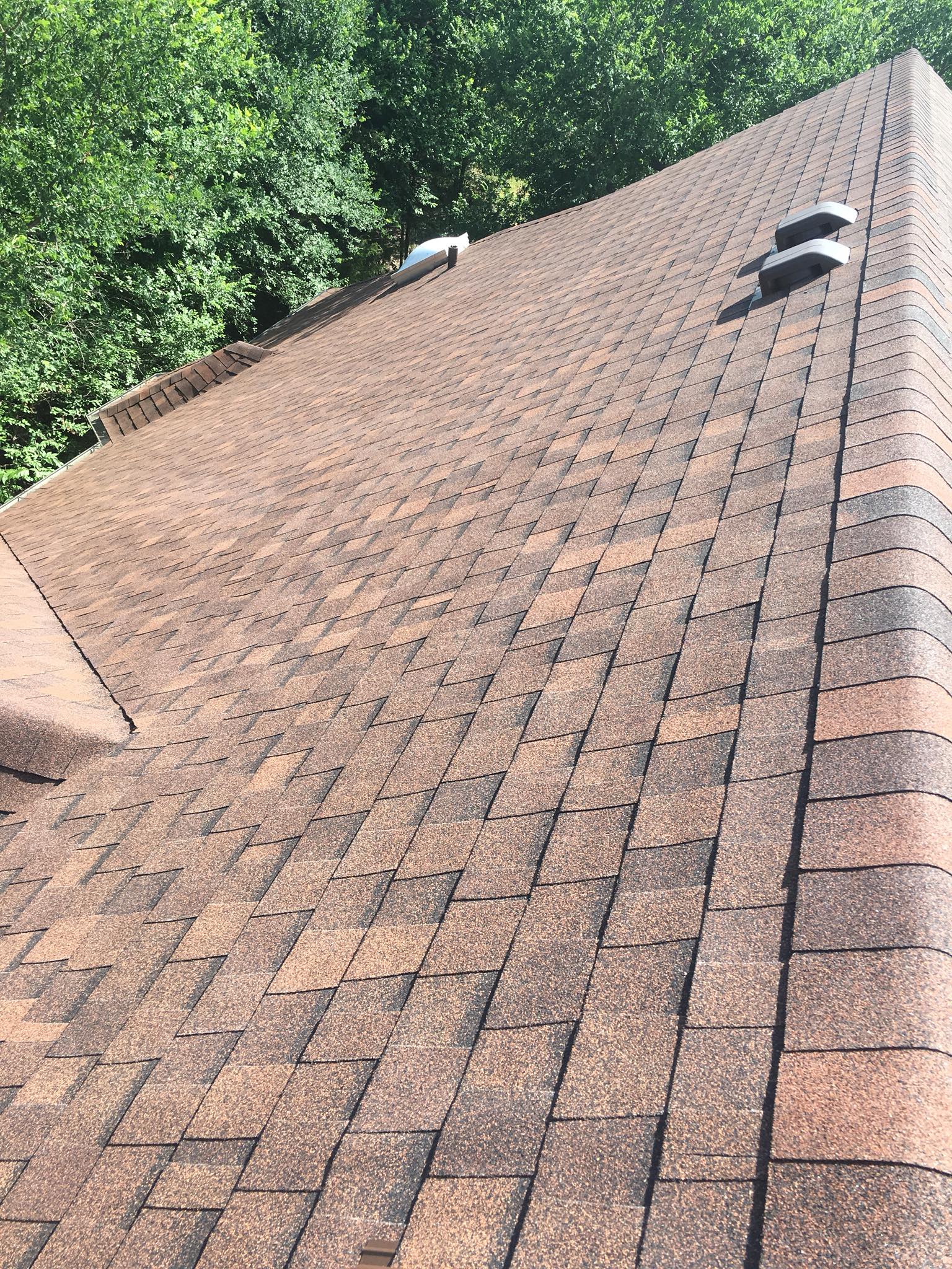 Taylor and Sons Construction &amp; Roofing Inc. Logo