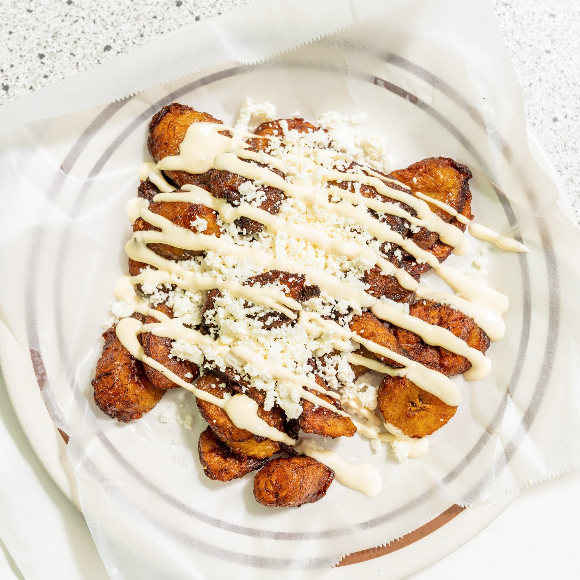 Platanos Fritos Queso Y Crema (Sour Cream and cheese)