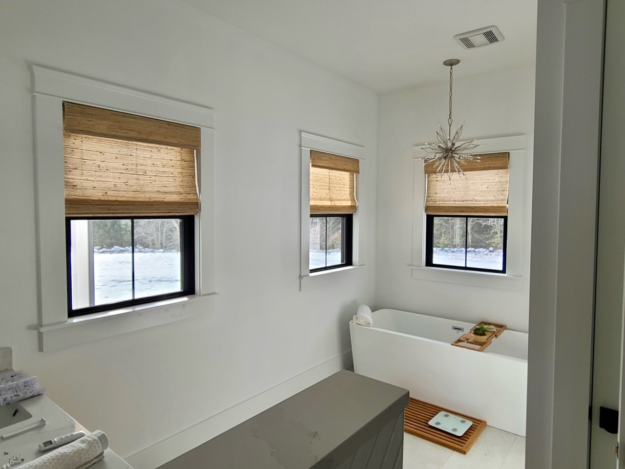 Bloggers and do-it-yourself designers choose Woven Wood Shades due to their ability to mix in with almost any deÌcor. Check out how seamlessly these Shades fit in the master bedroom and the bathroom in this house in Holden.