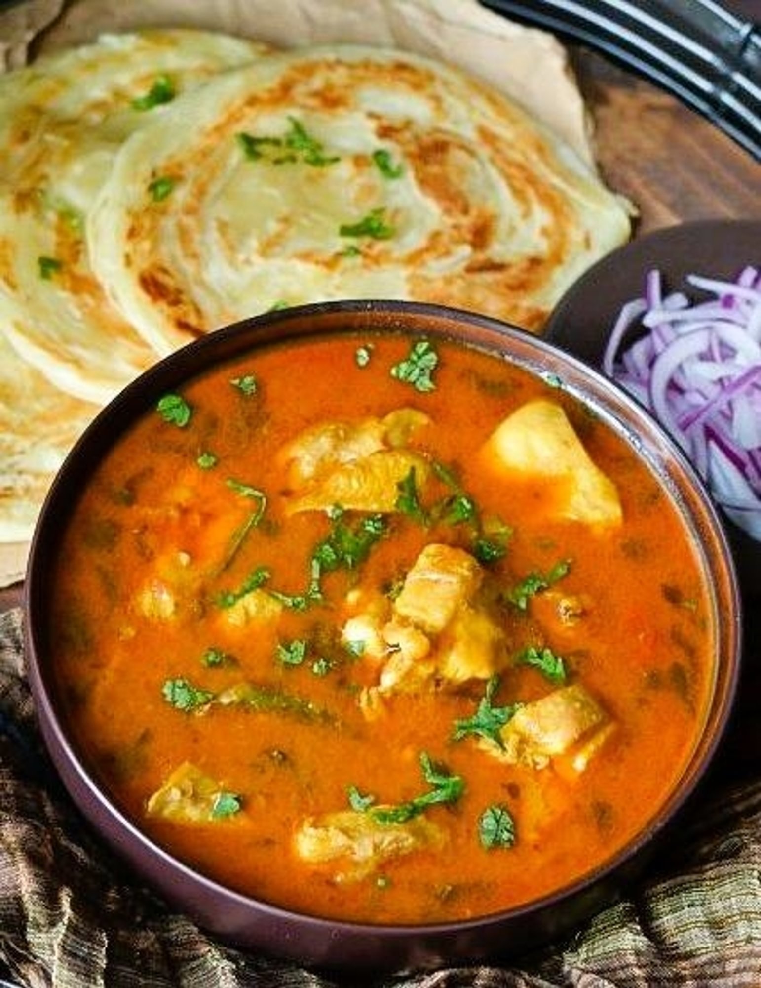 Parotta (2 pieces) & Chicken Salna
