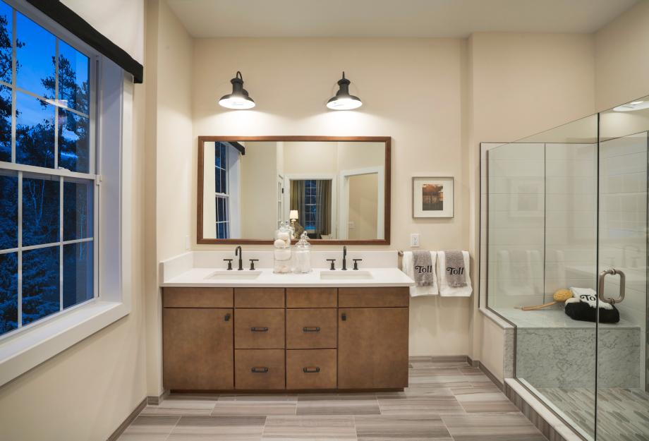 Primary bathroom with dual vanity and large shower