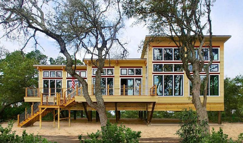 Built near Hilton Head, SC, this highly engineered hurricane-resistant beachfront Topsider home features a multi-level roofline designed for extraordinary ocean views.