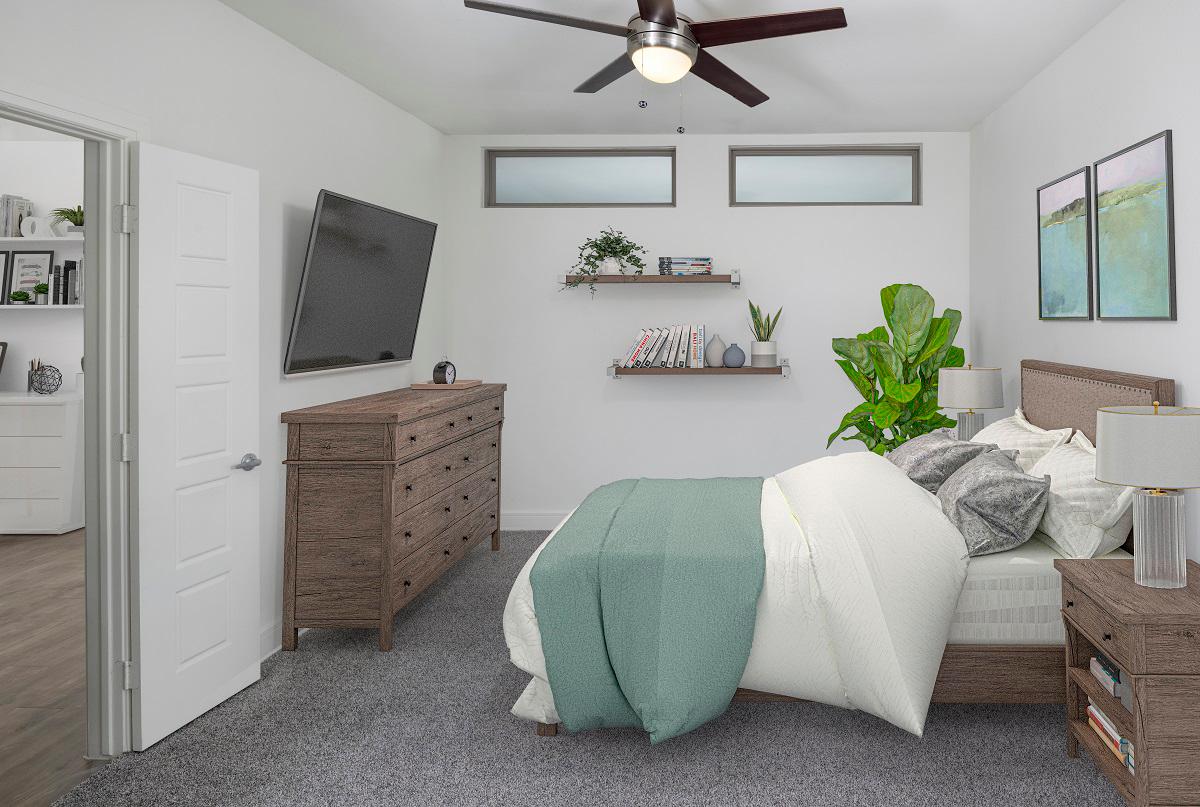 Flats bedroom with windows to the living room