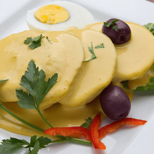 Papas O Yuca a La Huancaina
