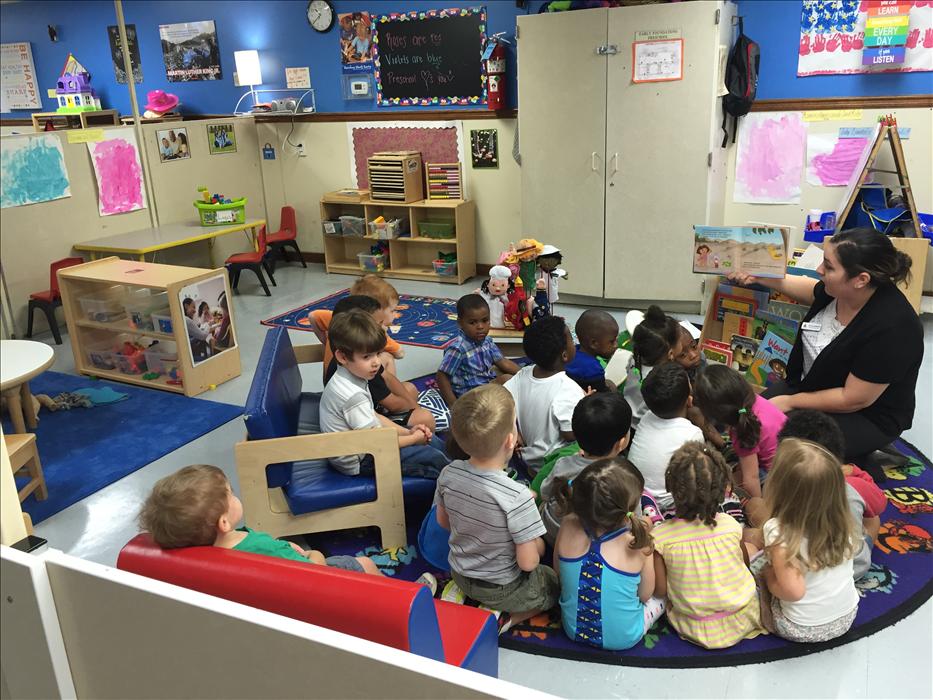 Preschool class was enjoying reading time with  Ms. Justina, our Assistant Director.