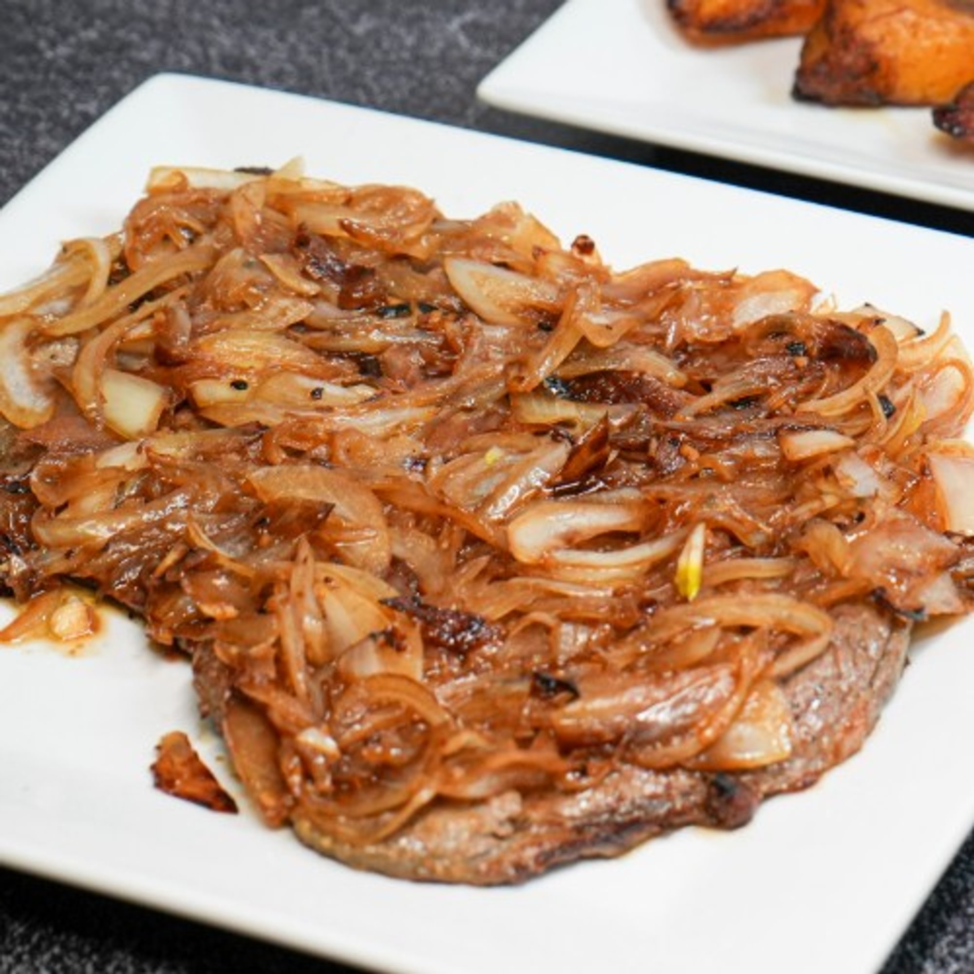 Bistec Encebollado