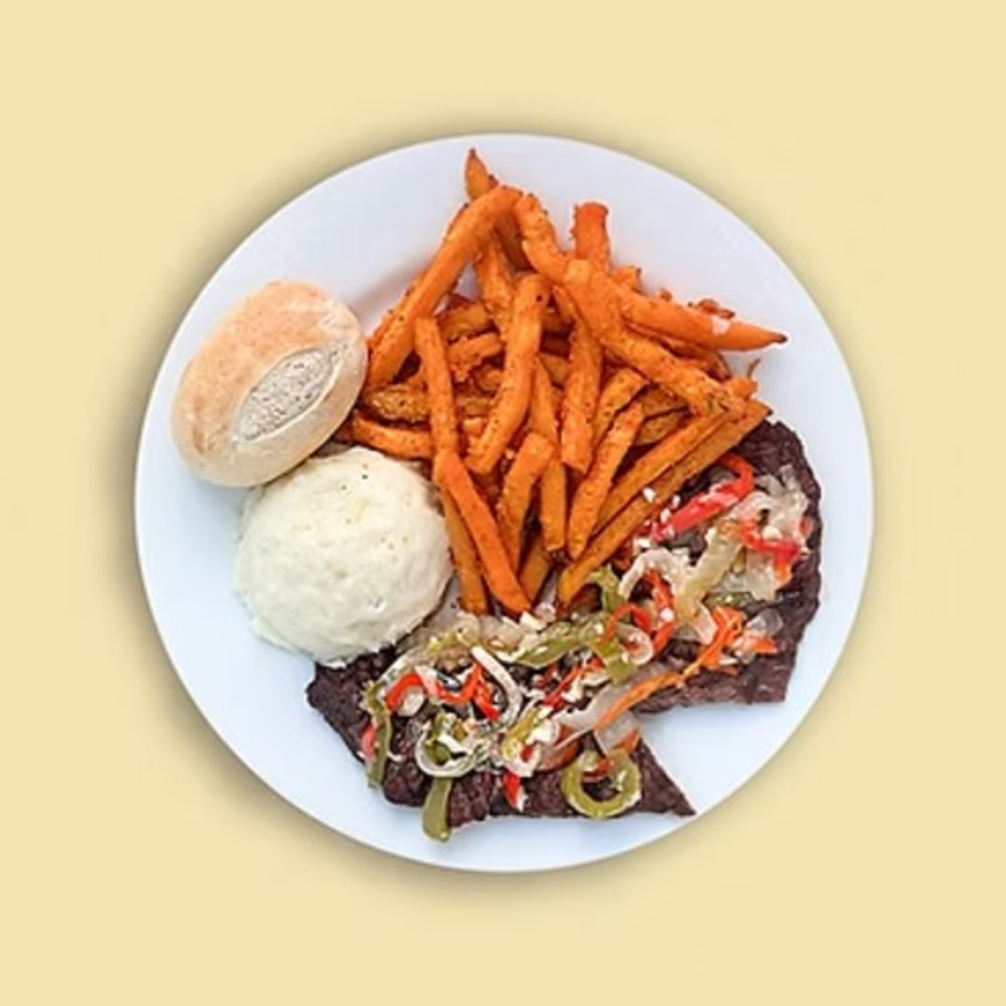 Oven-Baked Flank meat with Peppers and Onions