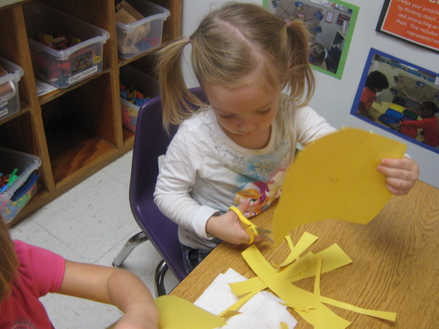 We improve our fine-motor skills with cutting practice!