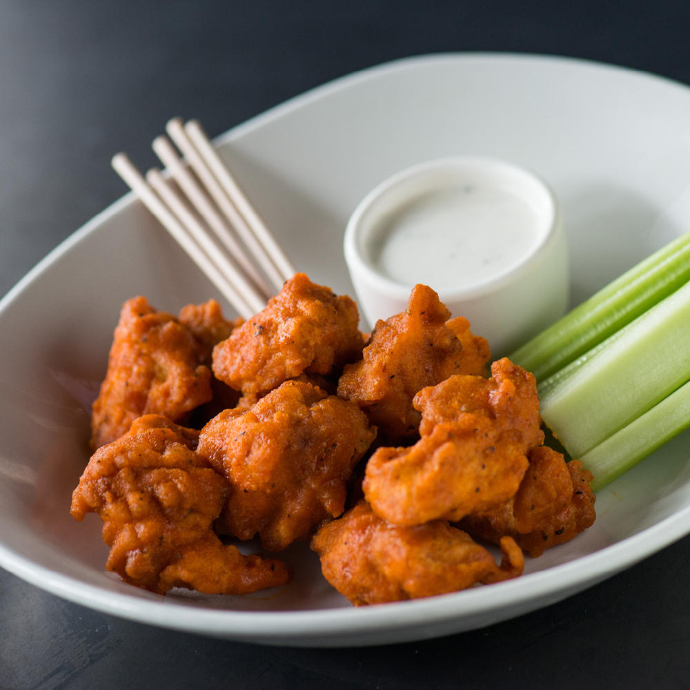 Try our Boneless Wings in five different flavors - buffalo, Korean chili garlic, BBQ, whiskey black pepper and lemon pepper dry rub.