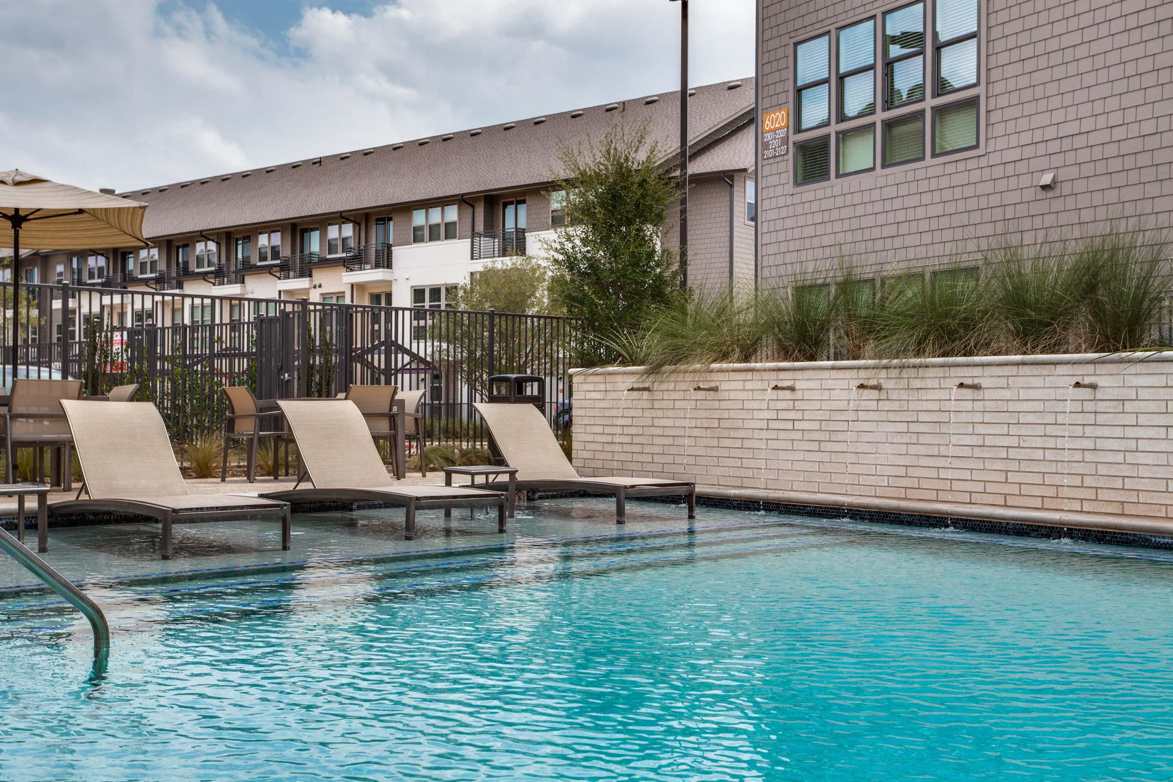 Villas side pool with in-water loungers