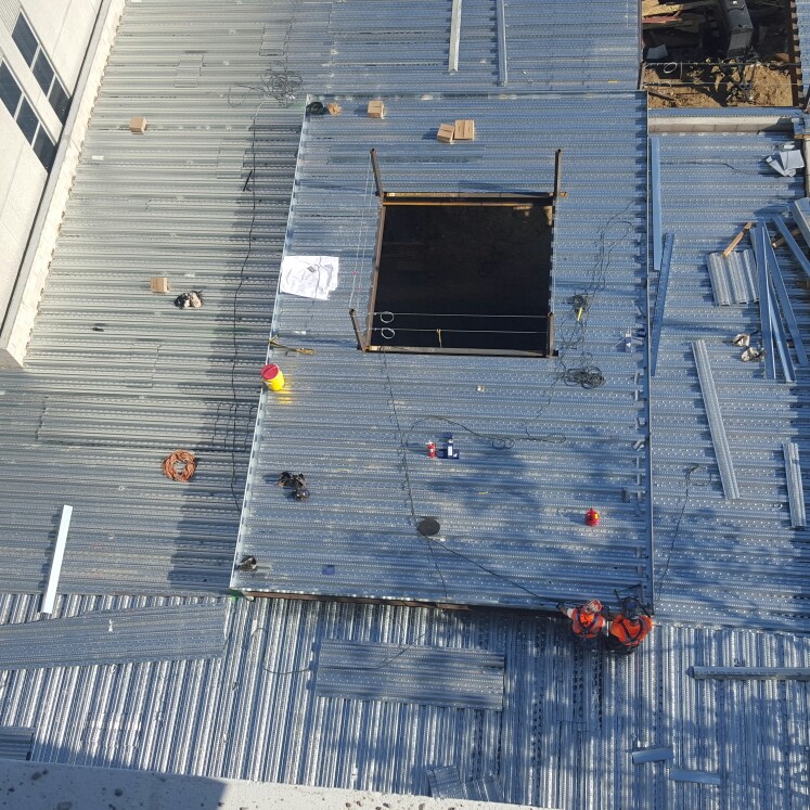 metal deck installation over steel framing.