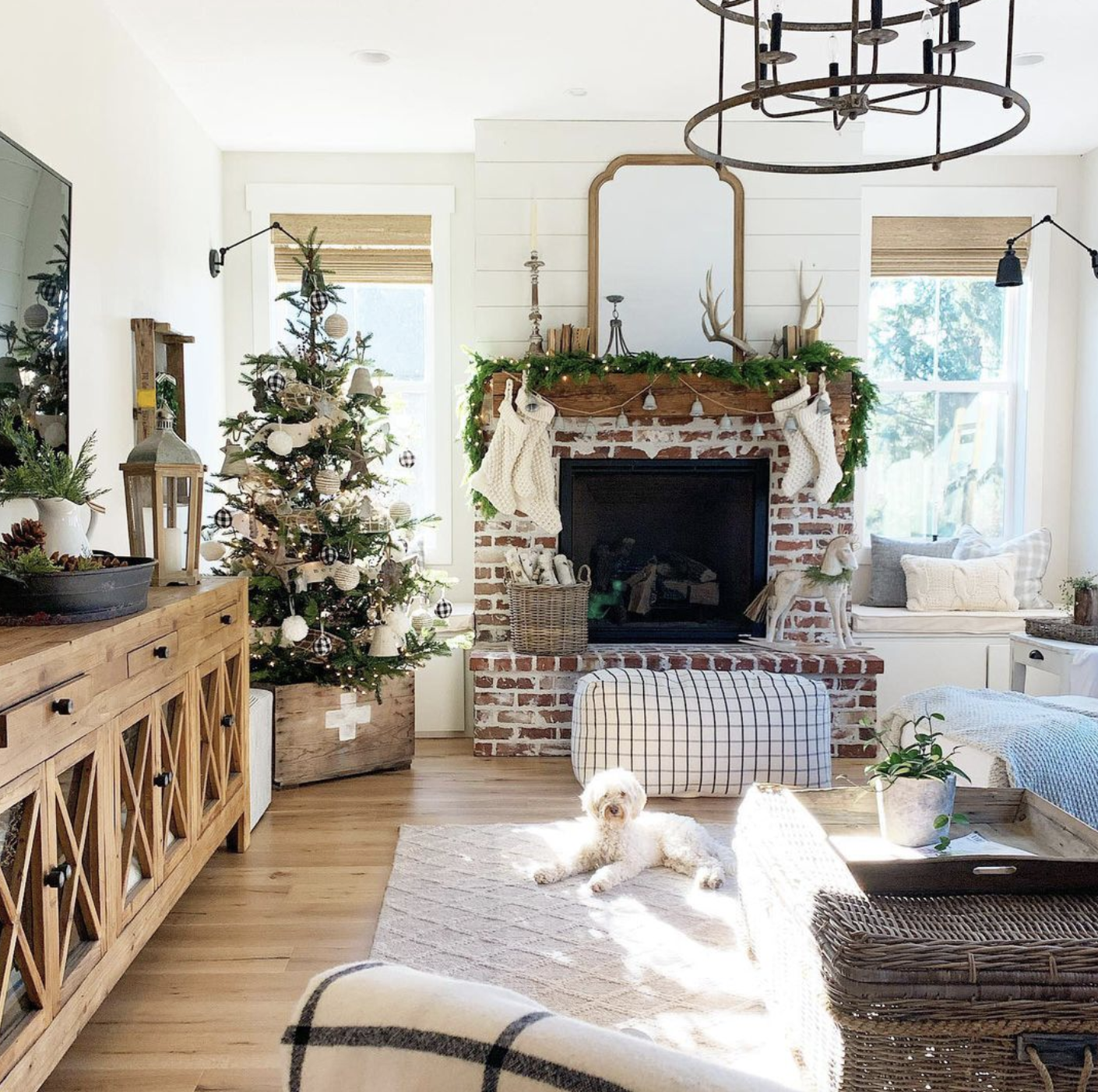 Matching textures in your home ties everything together. The woven wood shades match the decor in this living room perfectly and give the cozy, rustic feel that we all love around the holidays!