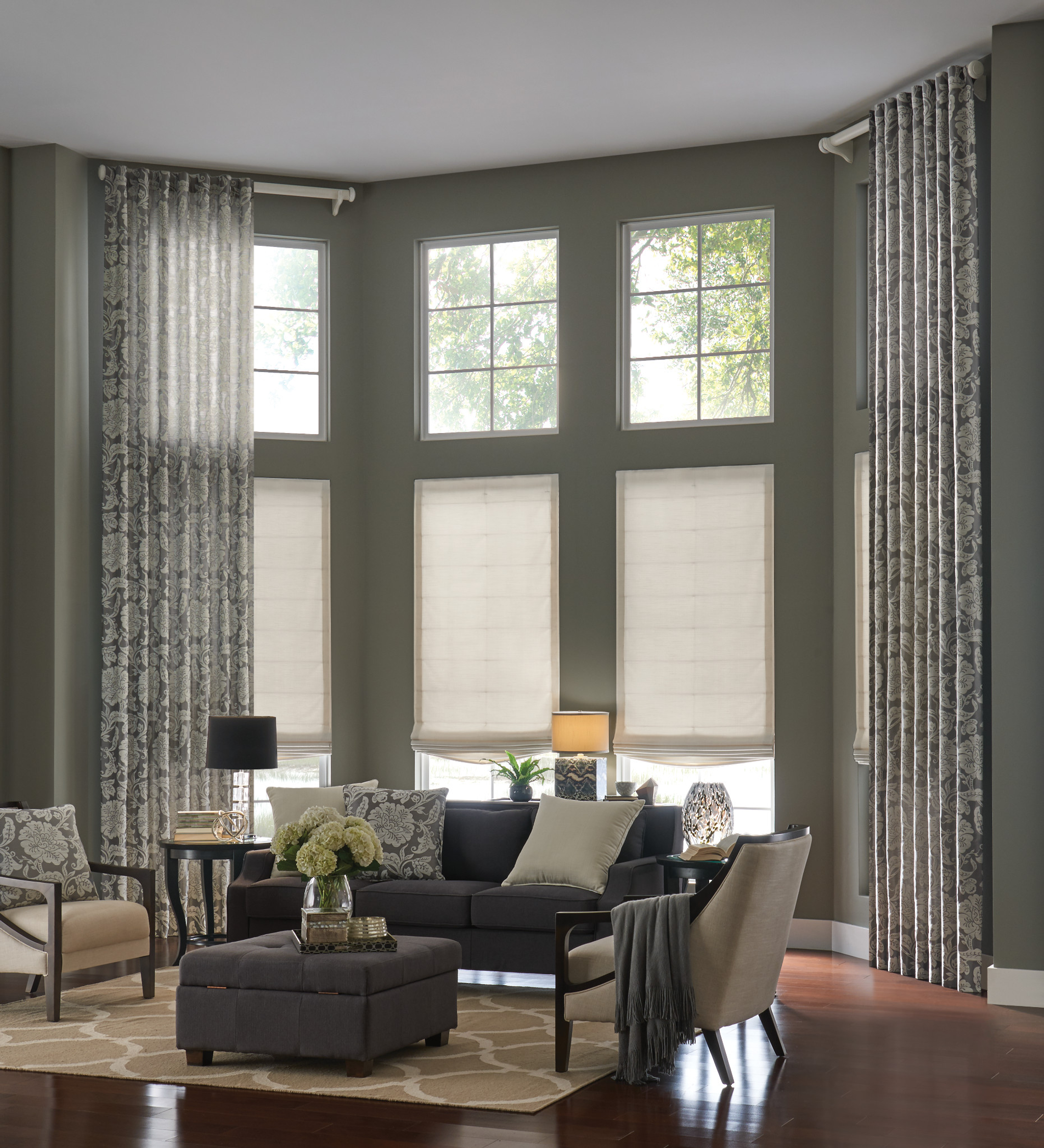 high ceiling drapery panels with roman shades and custom pillowsro