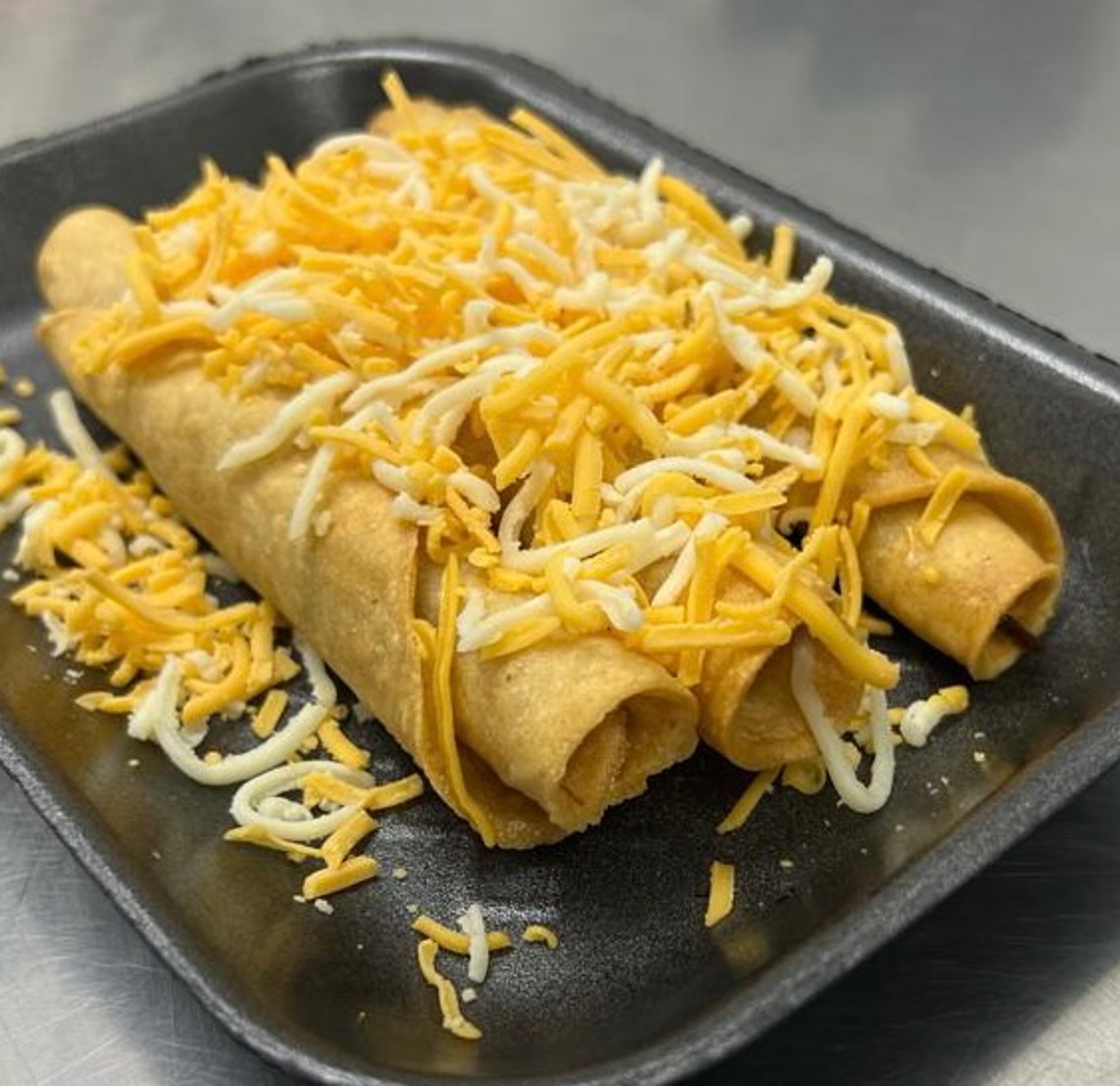3 Rolled Tacos with Cheese