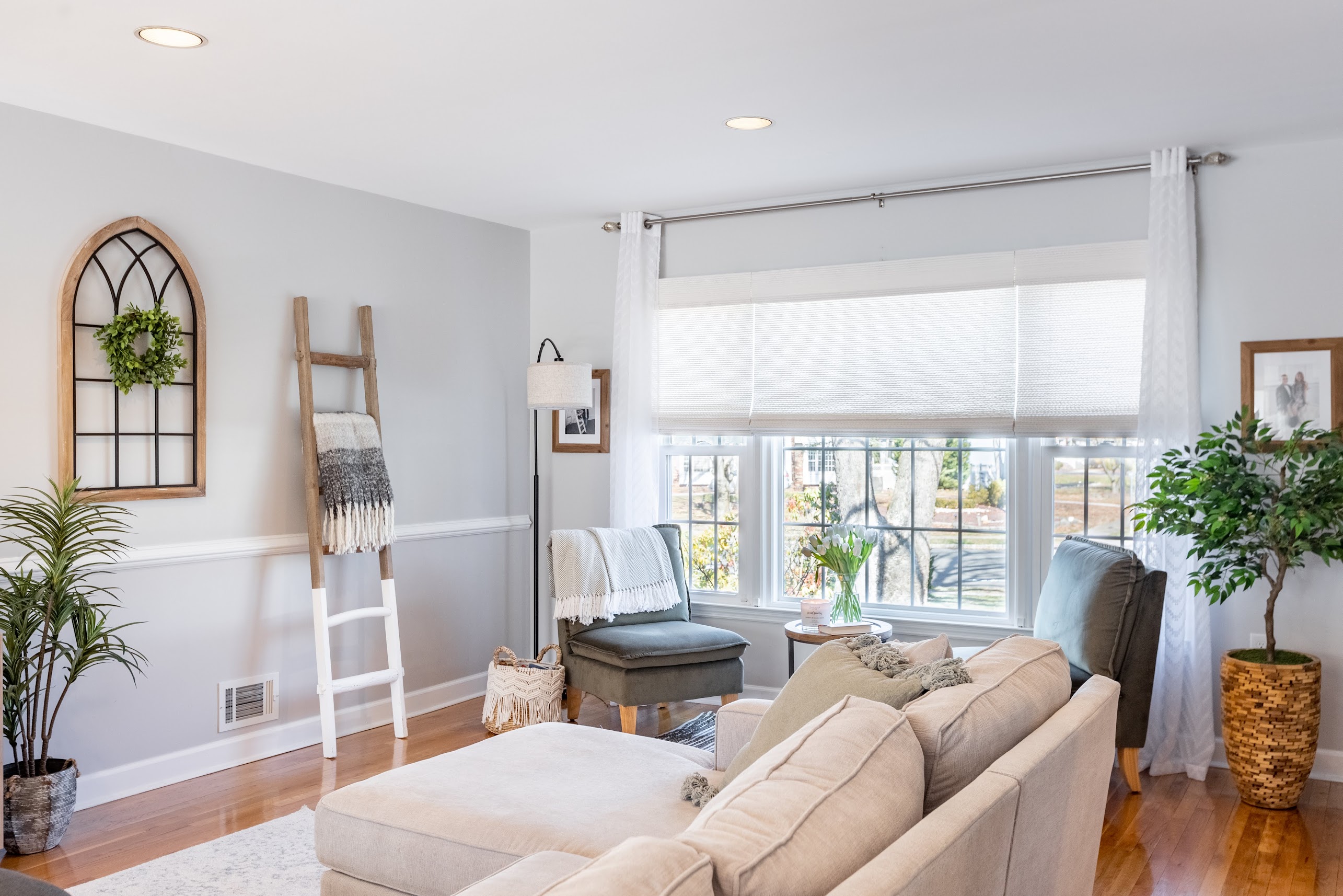 Woven woods were the perfect finishing touch for this simple and modern living room in Englishtown, NJ.