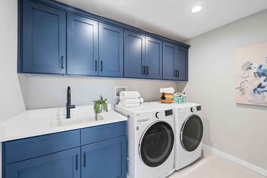 Laundry rooms conveniently located on the second floor in most home designs