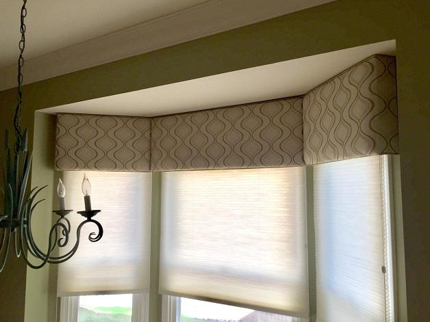 Elevate bay windows with Custom Cornice Boards from Budget Blinds of Phillipsburg. In this home, color and pattern gives the bay window a beautifully polished look.  BudgetBlindsPhillipsburg  CustomCorniceBoards  FreeConsultation  WindowWednesday
