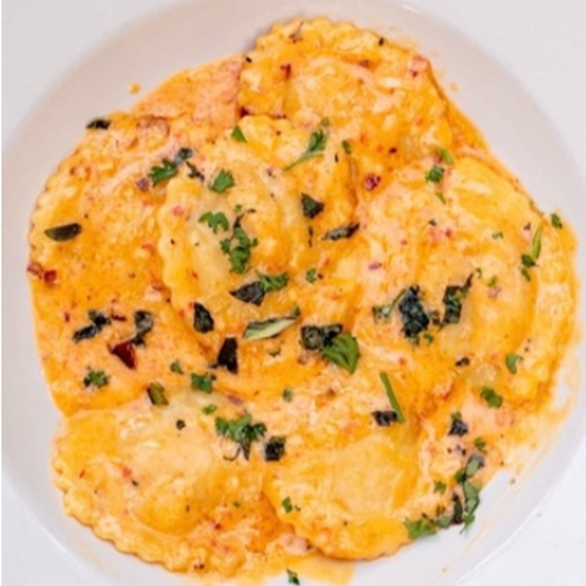 Butternut Squash Ravioli in Roasted Red Bell Pepper Sauce