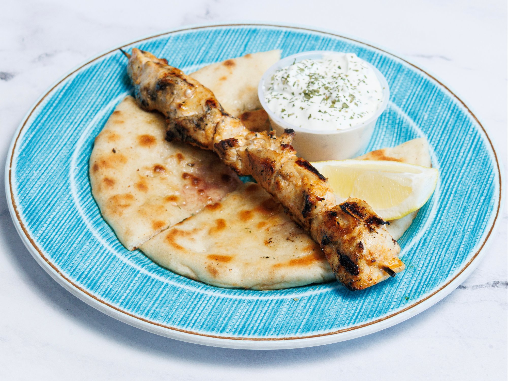 (1) CHICKEN SOUVLAKI SKEWER W/ PITA & TZATZIKI