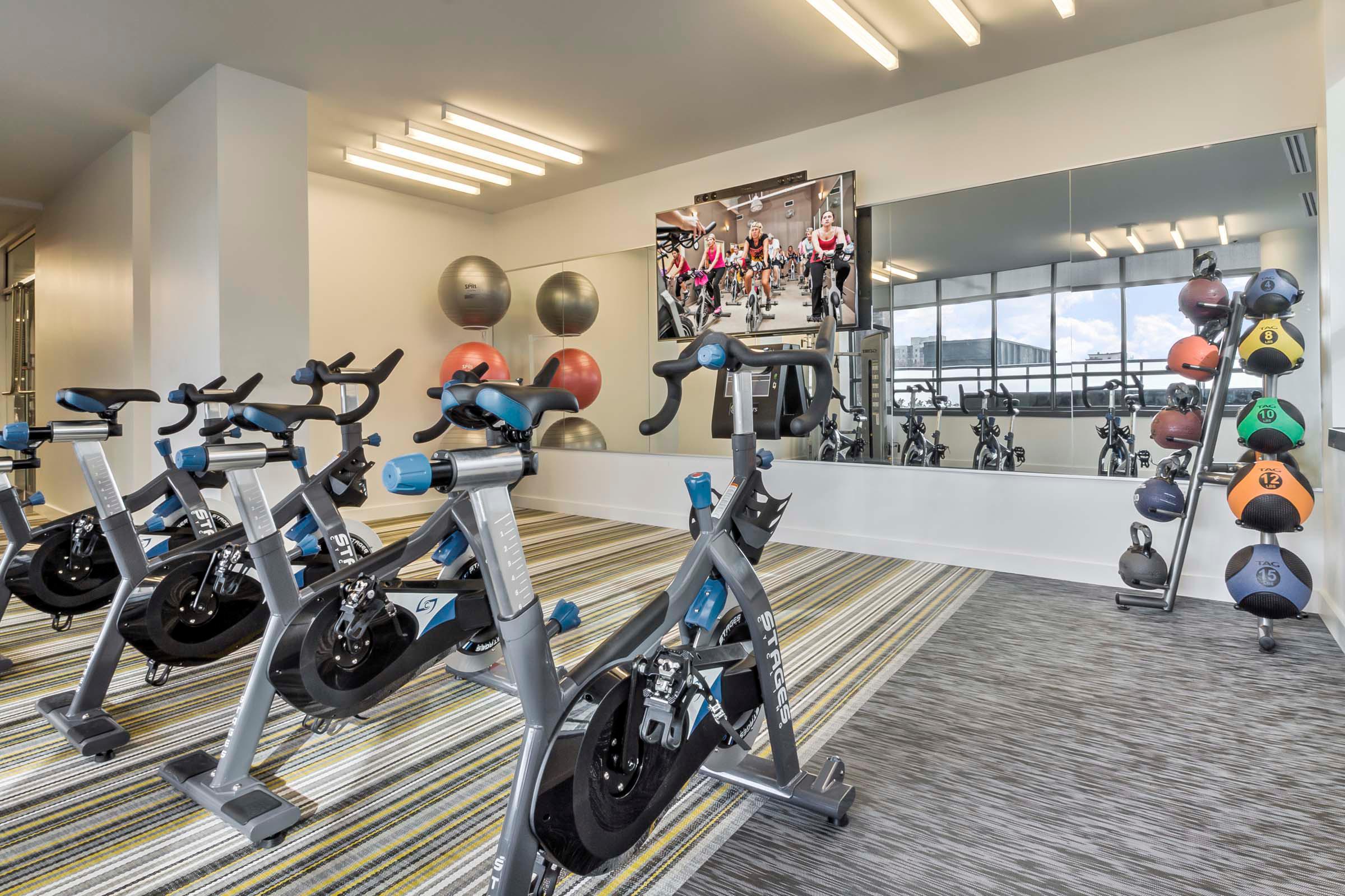 Two 24 hour fitness centers yoga and cycling studio