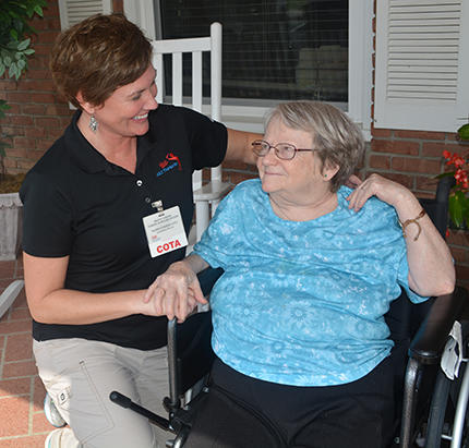 Mount Vernon resident with therapy team member.