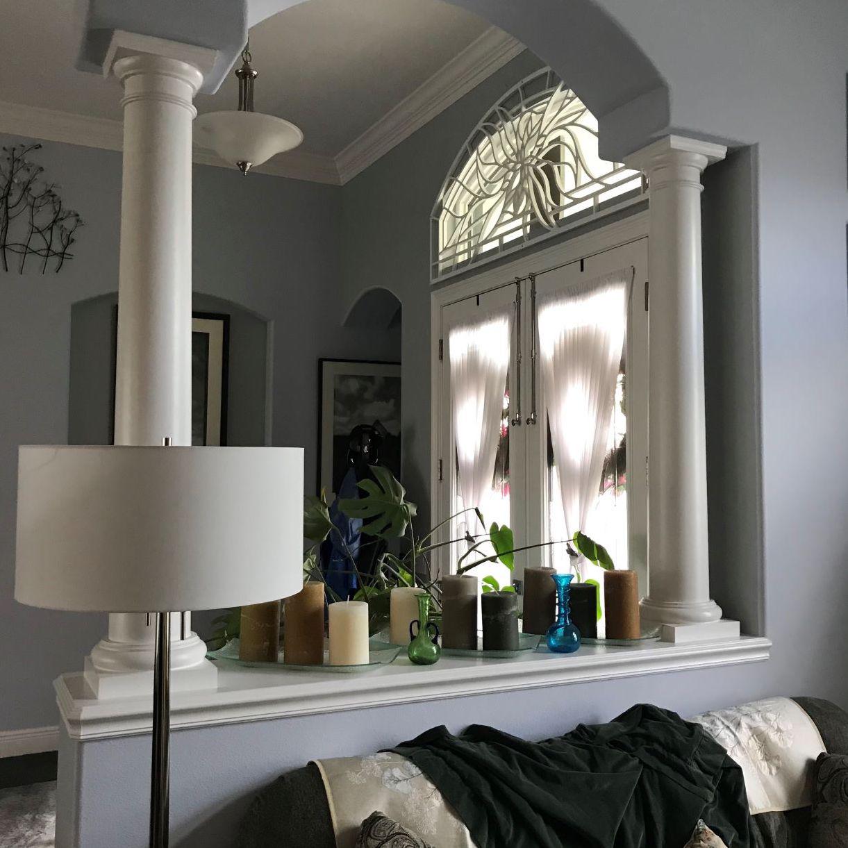 White Tableaux adds a flair to the arch of this entryway in Rockledge.