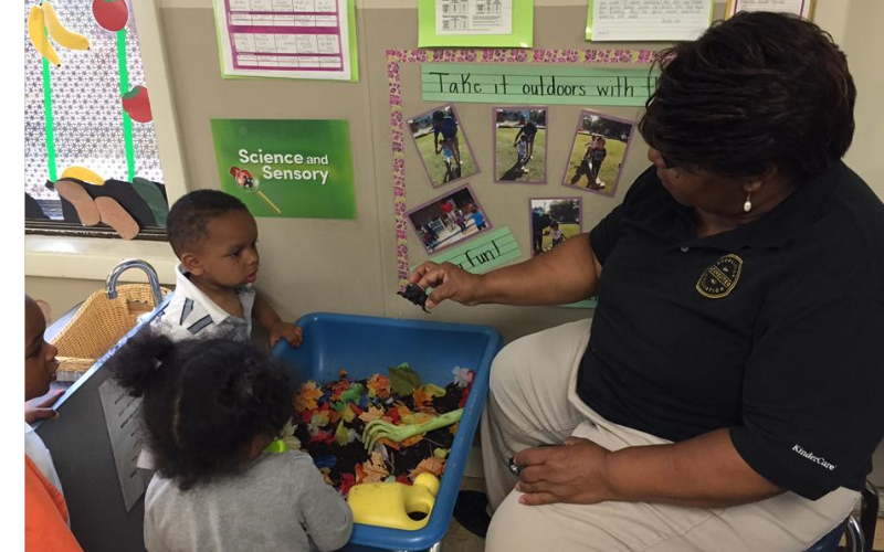 Our toddlers exploring and learning about garden and plants with Ms. Sandra.