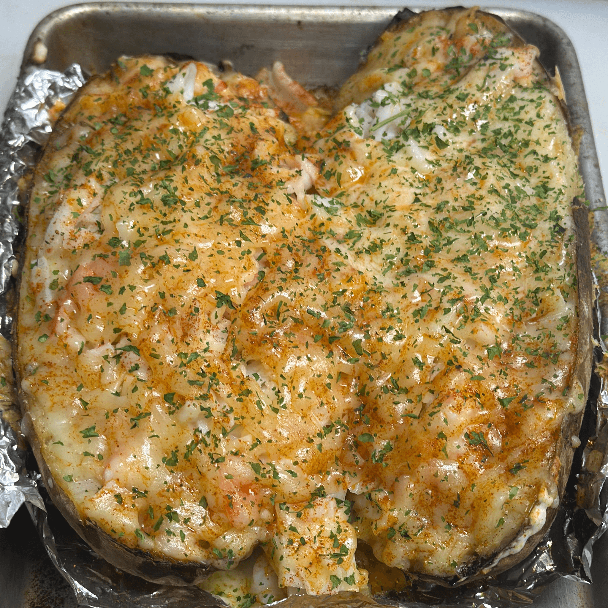 Seafood loaded baked potatoes