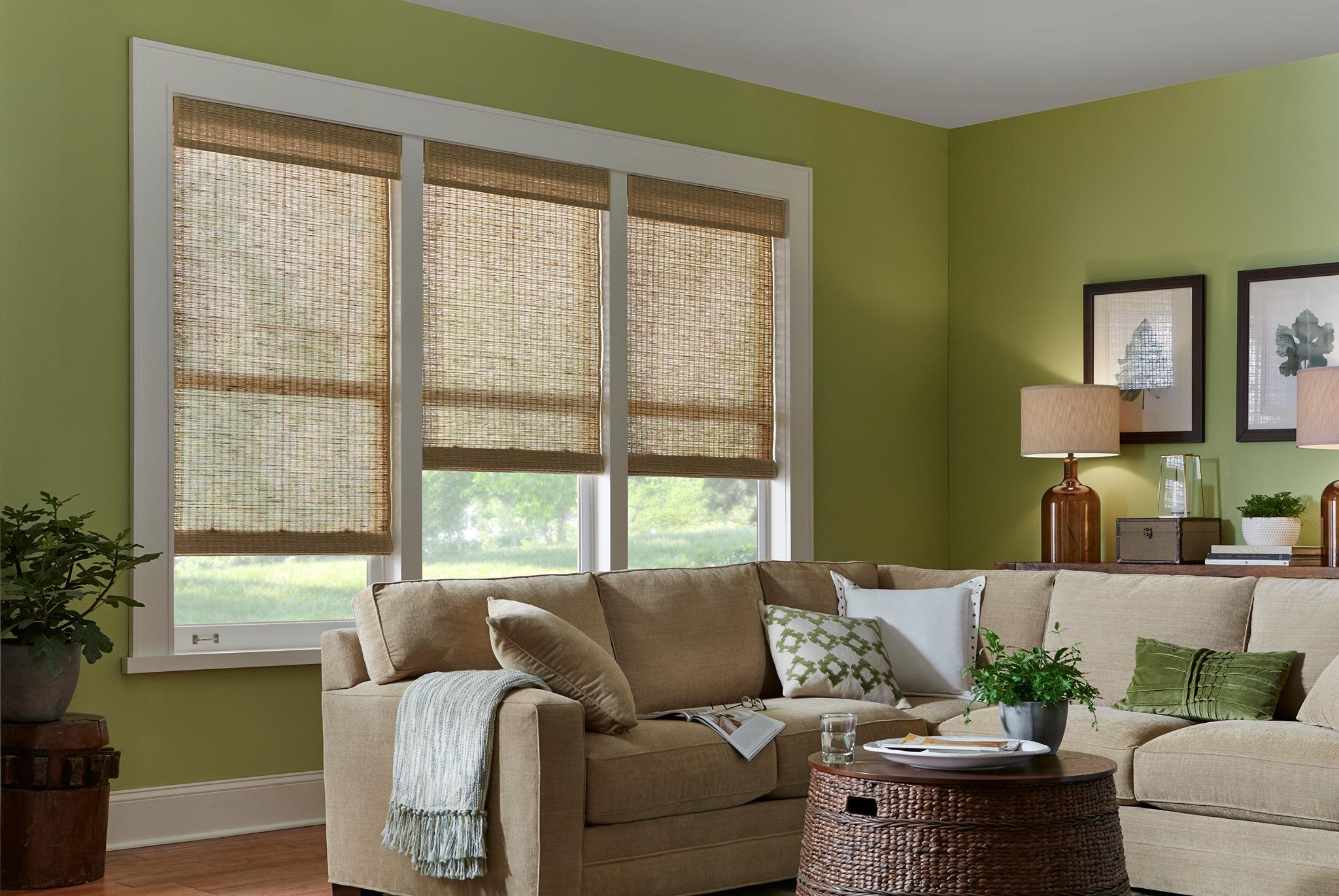 Roman Shades in Woven Wood material make this couch seem even more suitable for a nap