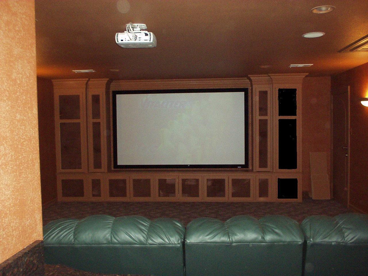 Mounted projector and screen. Klipsch RP-160 bookshelf speakers.