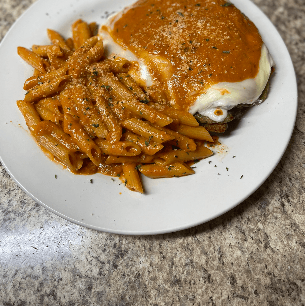 Chicken or Veal Parmigiana Entree