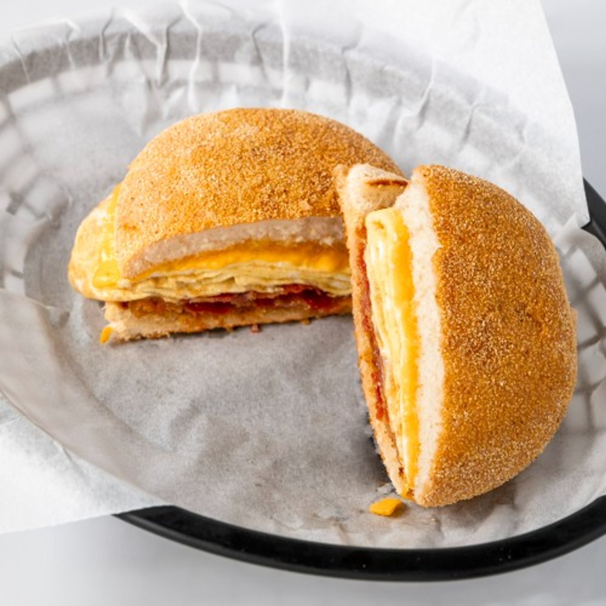 2. Croissant, English Muffin or Bun with Egg and Cheese