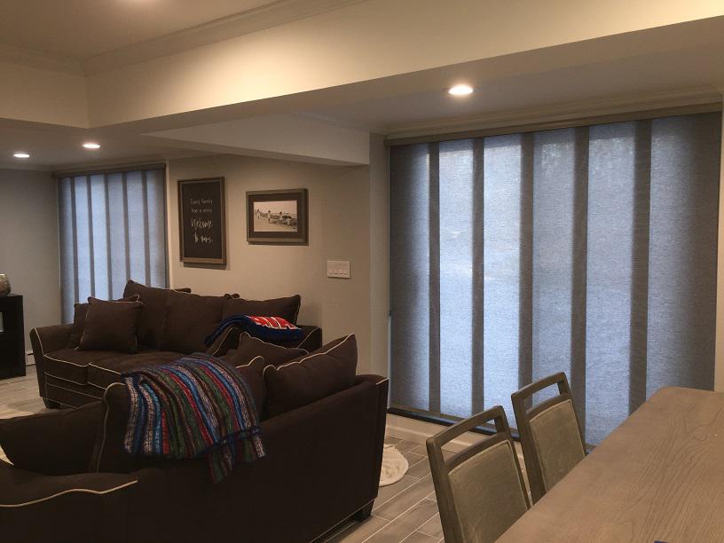 Give your glass sliding doors a makeover. This home features Sliding Panel Track Blinds by Budget Blinds of Phillipsburg to allow just enough light into the room without blocking access to the deck.  BudgetBlindsPhillipsburg  PanelTrackBlinds  BlindedByBeauty  VerticalBlindAlternatives  FreeConsulta