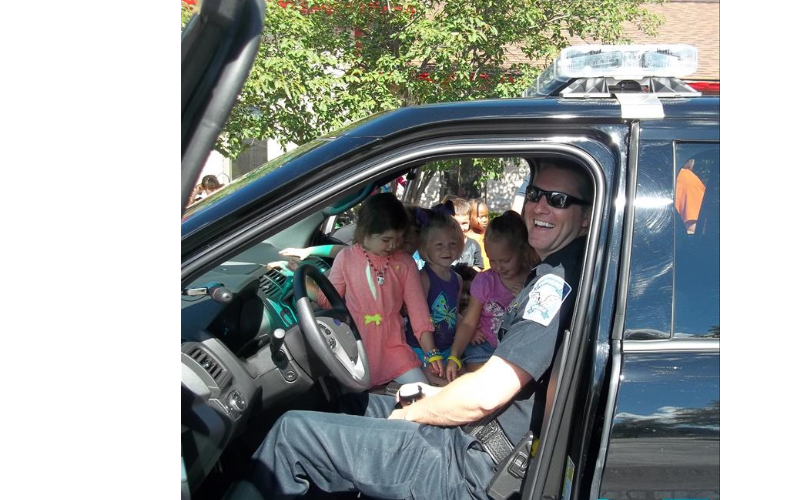 Fun with our Community Helpers!! How many kids can we squeeze into  police car??