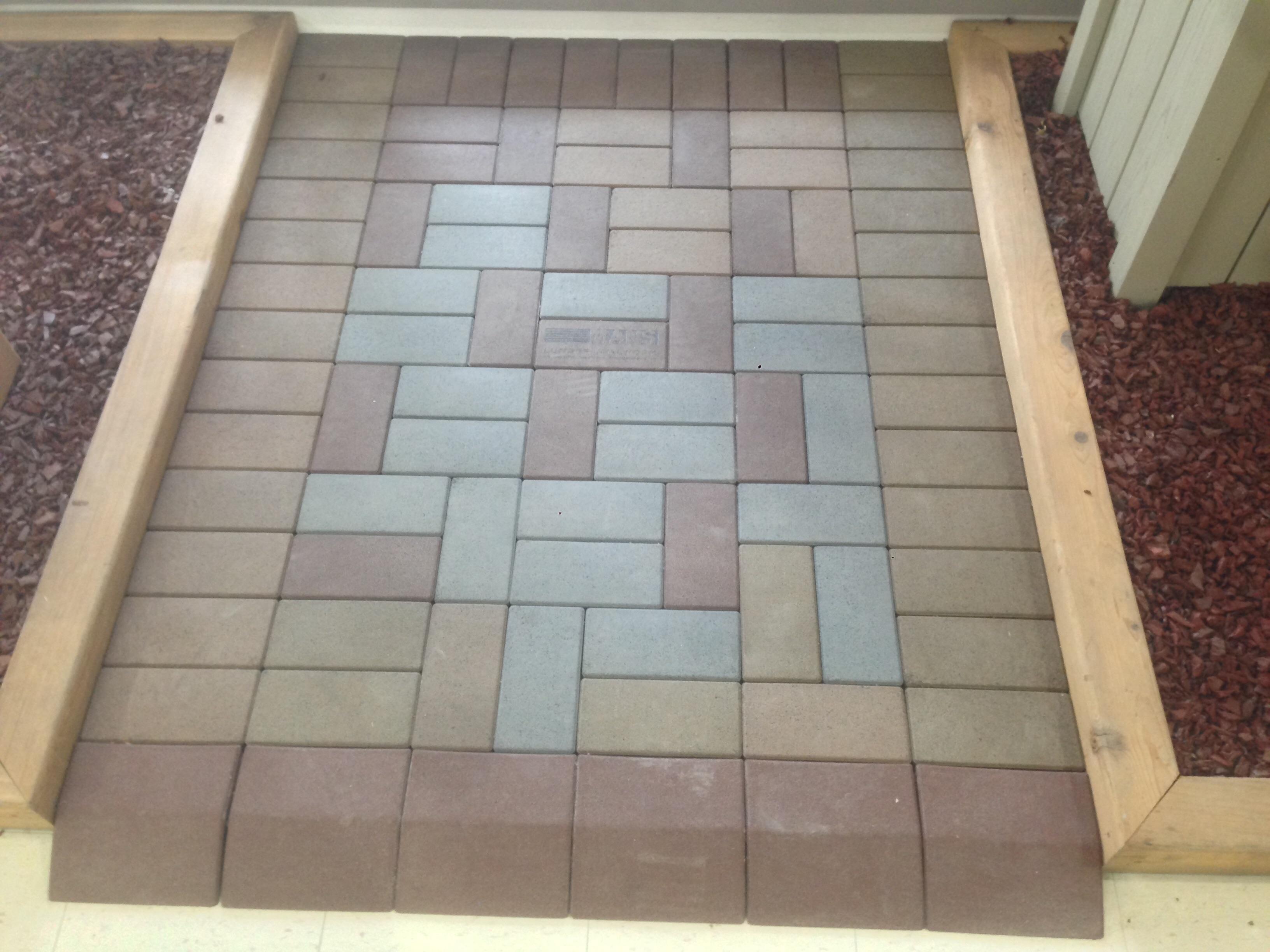 We offer a paver system made from recycled products and carries a lifetime warranty. Works great for covering over concrete porches, patios, and pathways.