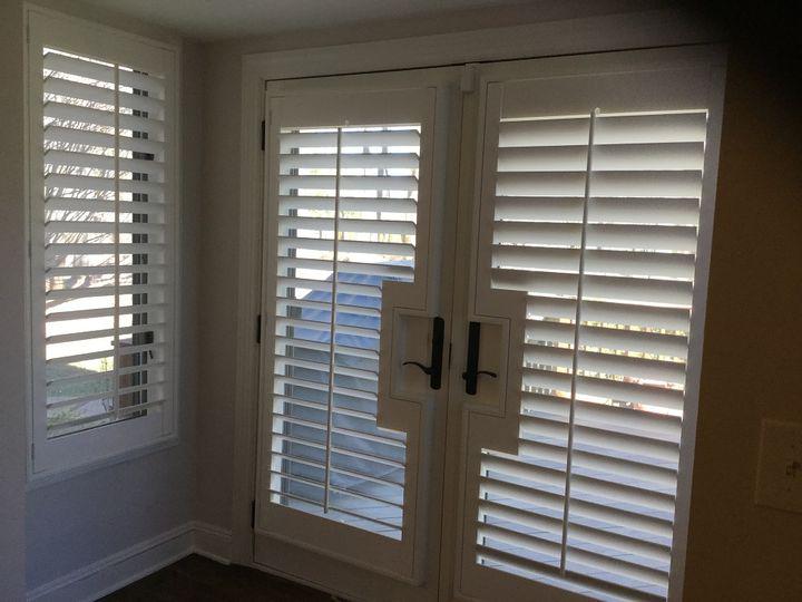 Custom Plantation Shutters by Budget Blinds of Phillipsburg can be customized to any size and shape to fit your home. These Shutters have been crafted to flow around the door handle, providing a clean, efficient look. Shutters offer additional insulation as well, making them perfect for homes with l