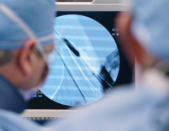 Physicians reviewing x-rays at Azura Surgery Center Cherry Hill