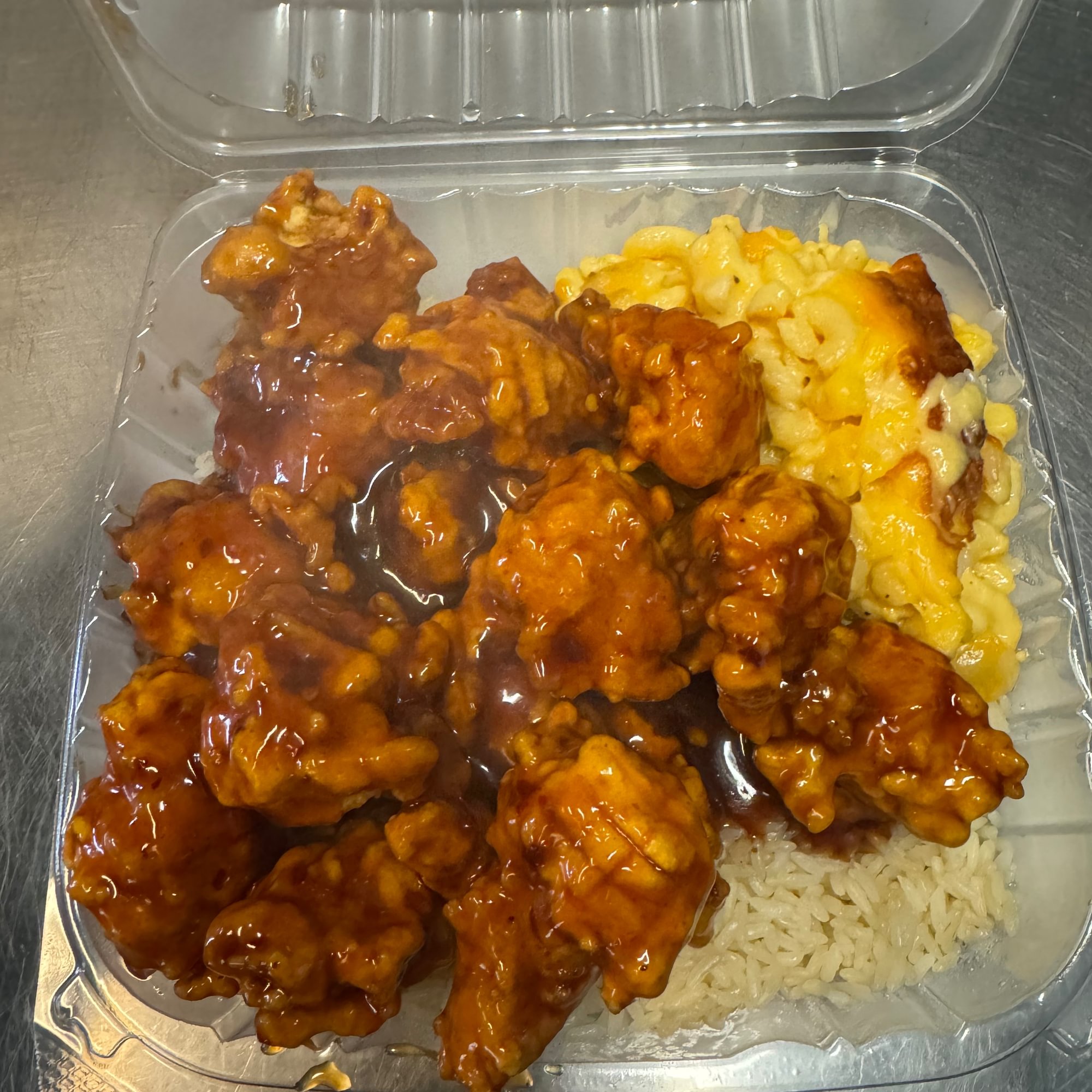 General Tso Chicken with White rice and two sides of your choice