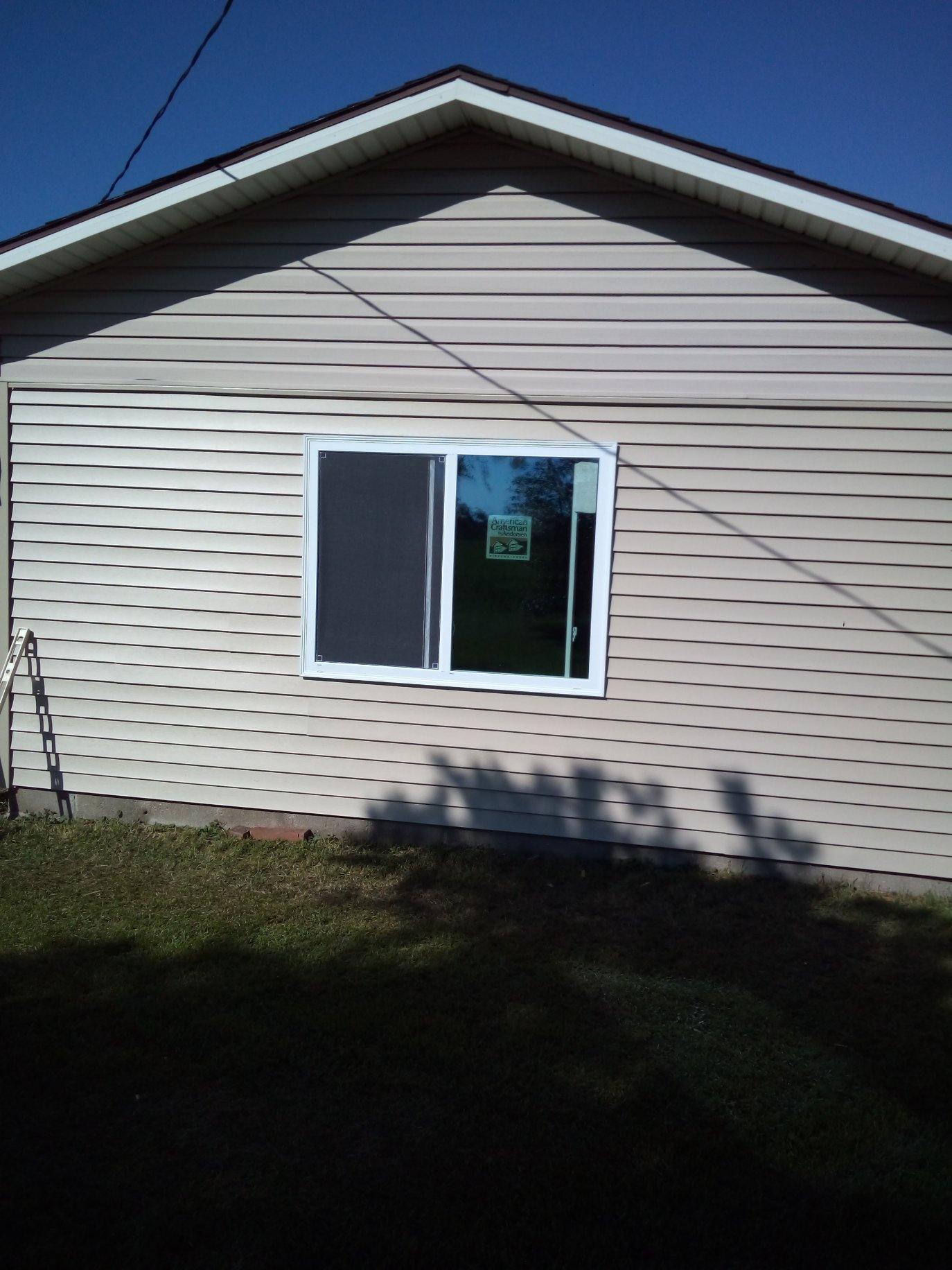 Wolfgang Home Improvement, LLC Logo